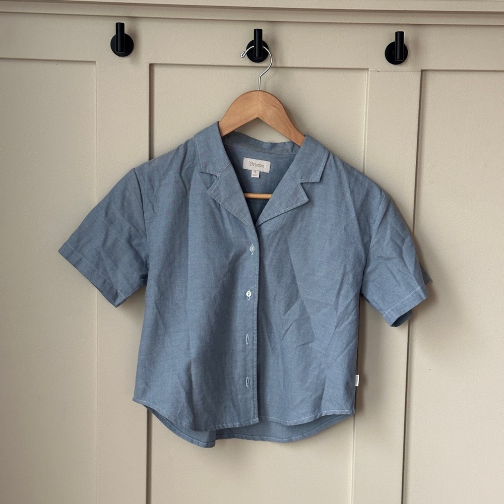 Small Blue Brixton shirt - one button needs to be sewn on. Button provided